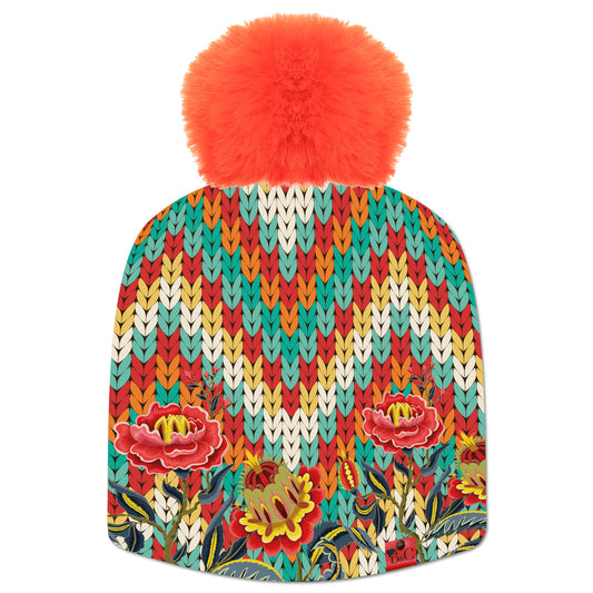Bonnet Audrey pour femmes, son imprimé floral et coloré s'accordera avec toutes vos tenues pour une pointe de couleur. Accompagné de son pompon orange pour ajouter une touche de glamour.