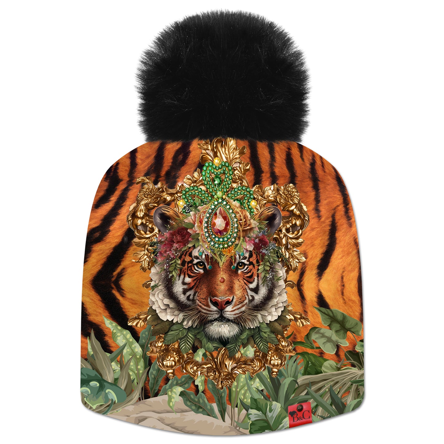 Bonnet Cristiano pour enfants avec un motif exotique de tête de tigre ornée d'une couronne de bijoux sur un fond de fourrure tigré. Le bonnet est accompagné de son pompon en fourrure synthétique noir et son étiquette en cuir rouge signée Beanie and Clyde.