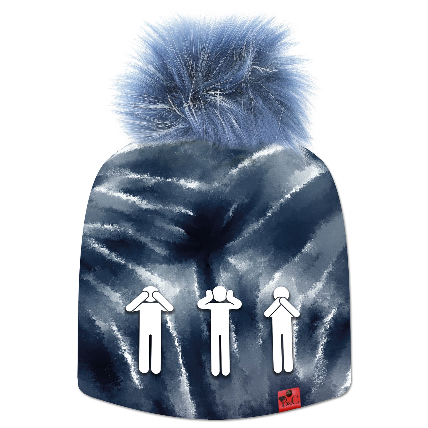 Bonnet tie and dye bleu foncé et blanc nommé Miyazaki, pour hommes, femmes et enfants, orné d’un pompon Bleu Fumée en fourrure synthétique. Trois pictogrammes représentant les singes de la sagesse – ne rien voir, ne rien entendre, ne rien dire – sont placés au premier plan.