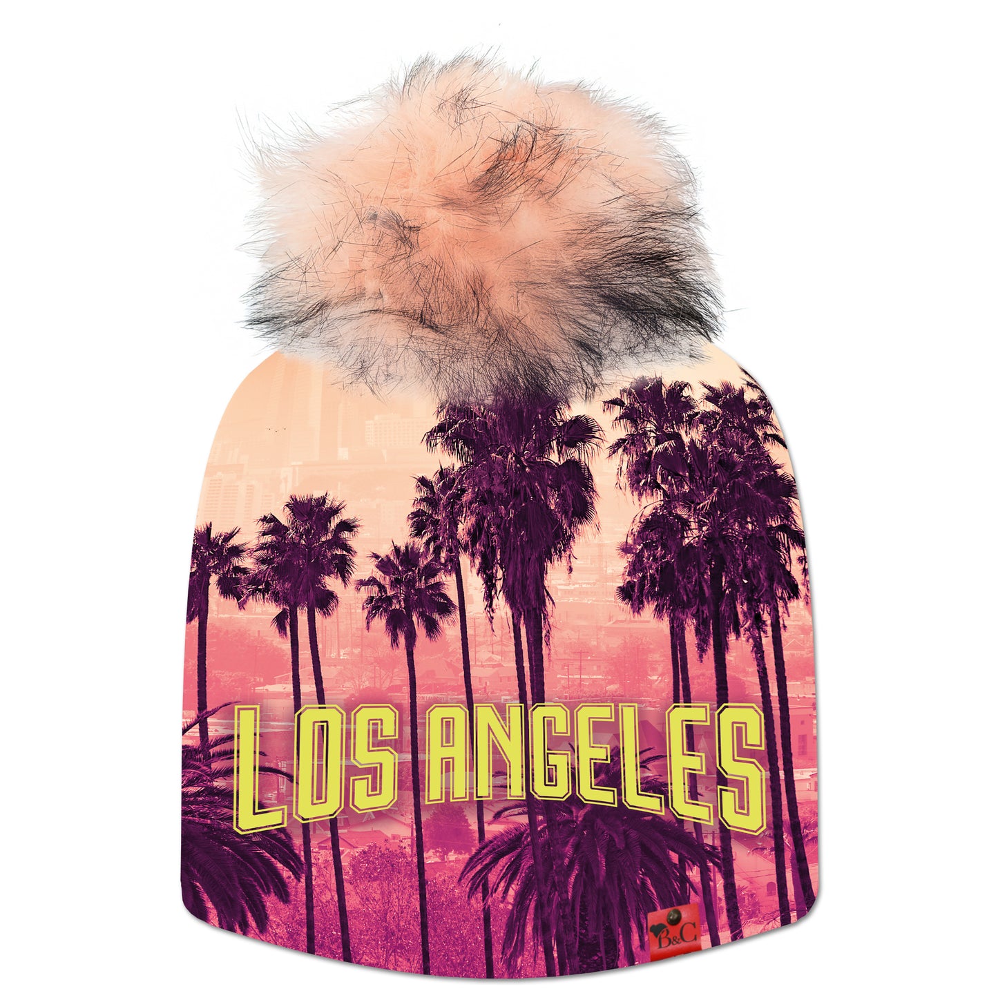 Bonnet Pink pour enfants, son imprimé est doux et frais, avec un paysage de palmiers dans un style à la "cité des anges". Il est sublimé par son pompon Flamant Rose en synthétique et de son étiquette en cuir synthétique rouge signée Beanie and Clyde.