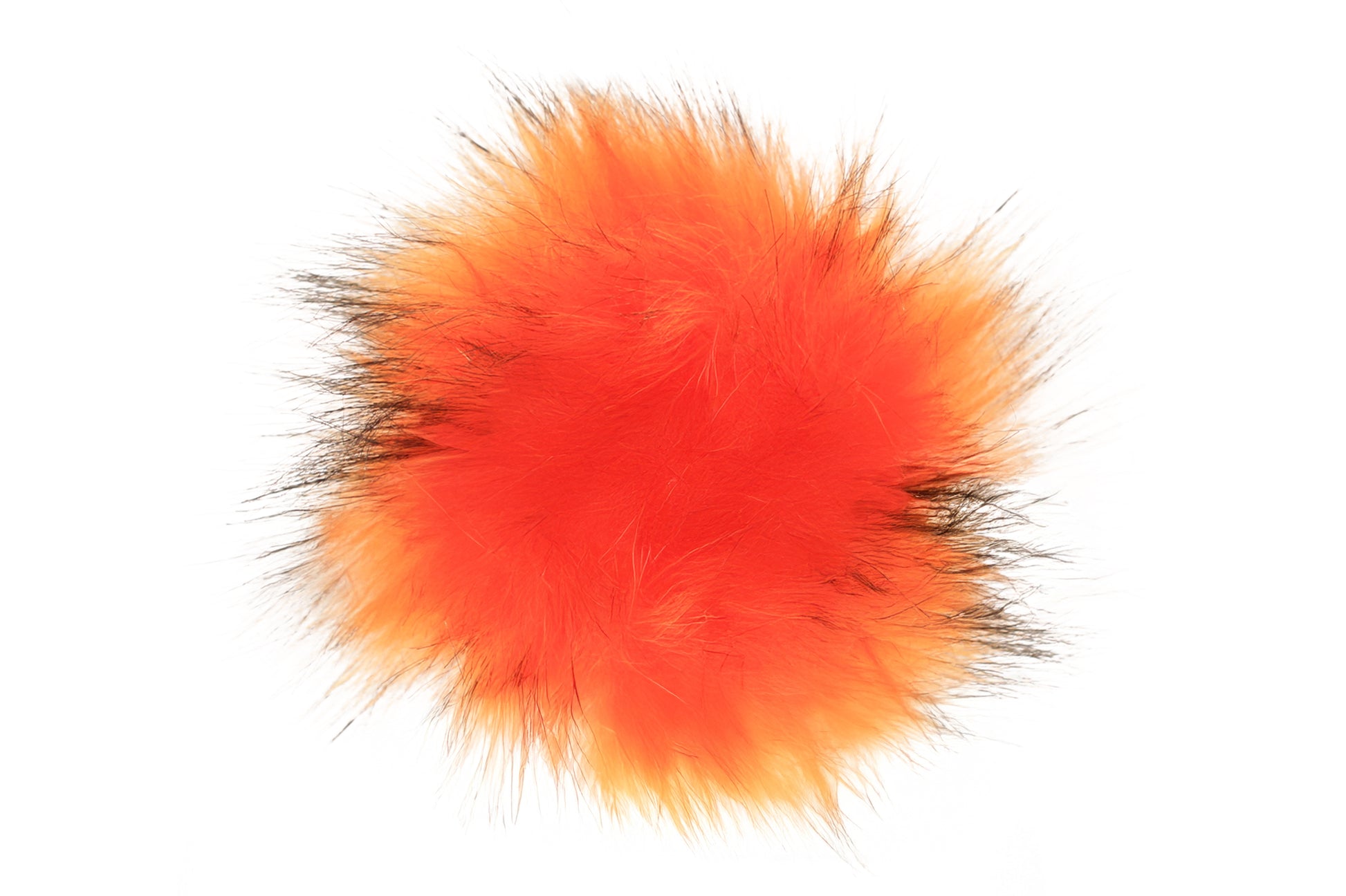 Un pompon aux couleurs chaudes et naturelles, mélangeant des nuances de roux, orange et brun, inspirées de la fourrure du renard. Ce pompon évoque l'énergie et la chaleur de l'automne, parfait pour ajouter une touche de confort et de caractère à vos créations.