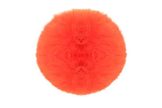 Pompon orange, dans une teinte vive et dynamique, avec une texture douce et joyeuse, idéal pour ajouter une touche énergique et originale à votre bonnet.