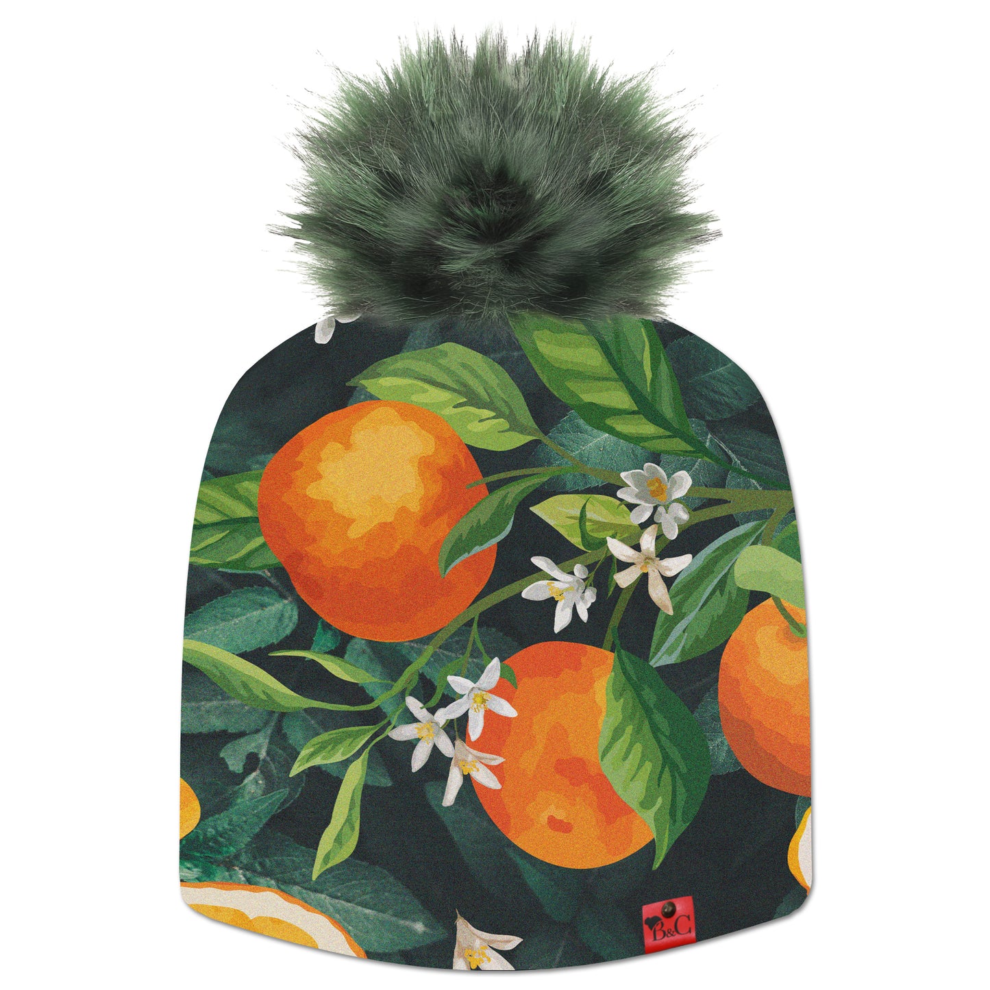 Bonnet Billie pour enfants, avec des motifs d'oranges, de fleur et des feuilles vertes et son pompon sequoia en fourrure synthétique, rien de tel pour une touche fruitée.