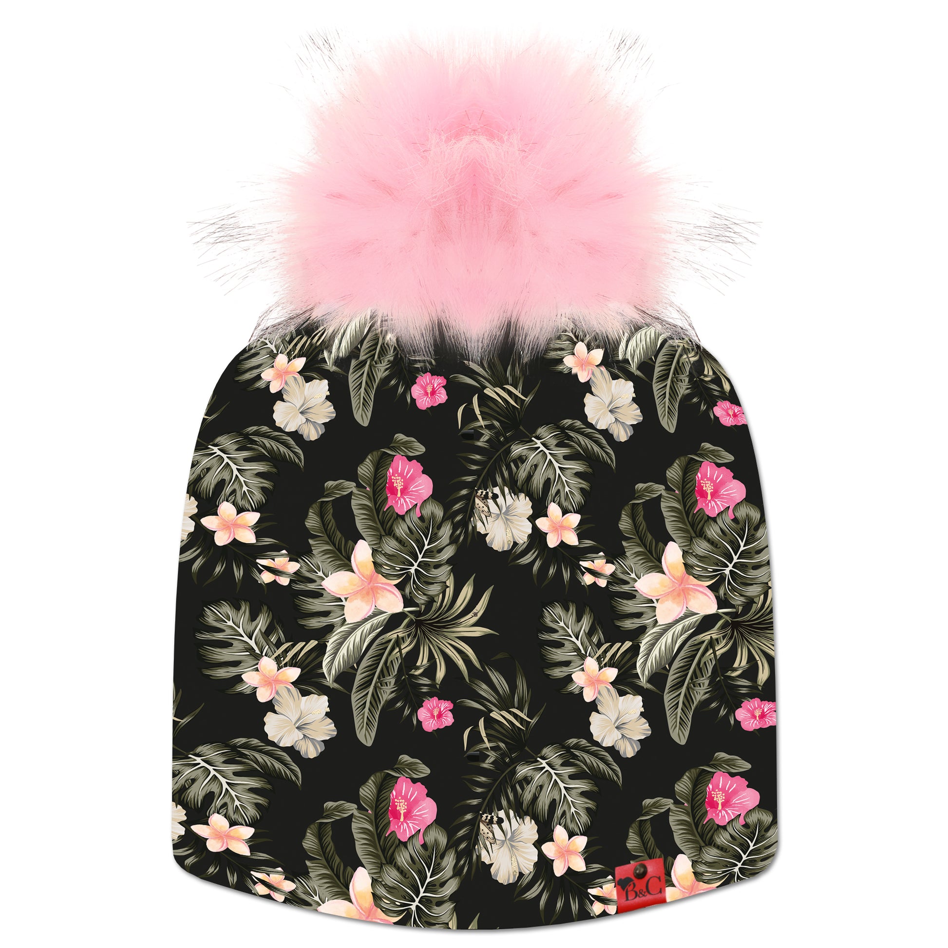 Bonnet Hepburn pour enfants, avec des motifs de fleurs rose, jaunes et des plantes, accompagné de son pompon Rose Candy fourrure synthétique et de son étiquette en cuir rouge signée Beanie and Clyde.