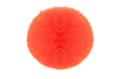 Pompon orange, dans une teinte vive et dynamique, avec une texture douce et joyeuse, idéal pour ajouter une touche énergique et originale à votre bonnet.