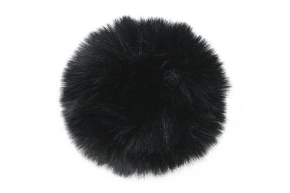 Pompon noir, au ton classique et polyvalent, avec une texture douce et raffinée, idéal pour apporter une touche chic et intemporelle à votre bonnet.